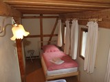 Kleines Schlafzimmer mit Fachwerk